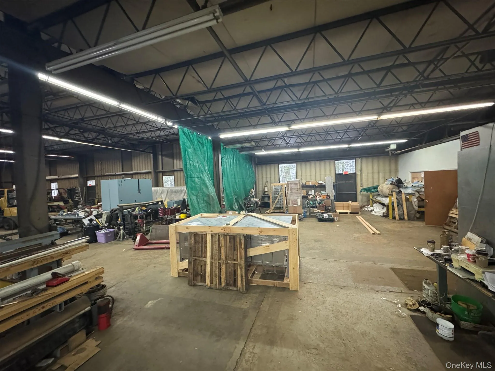 Miscellaneous room with a workshop area Miscellaneous room with a workshop area