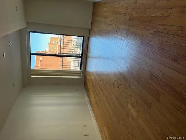 Spare room featuring light wood finished floors and recessed lighting Spare room featuring light wood finished floors and recessed lighting