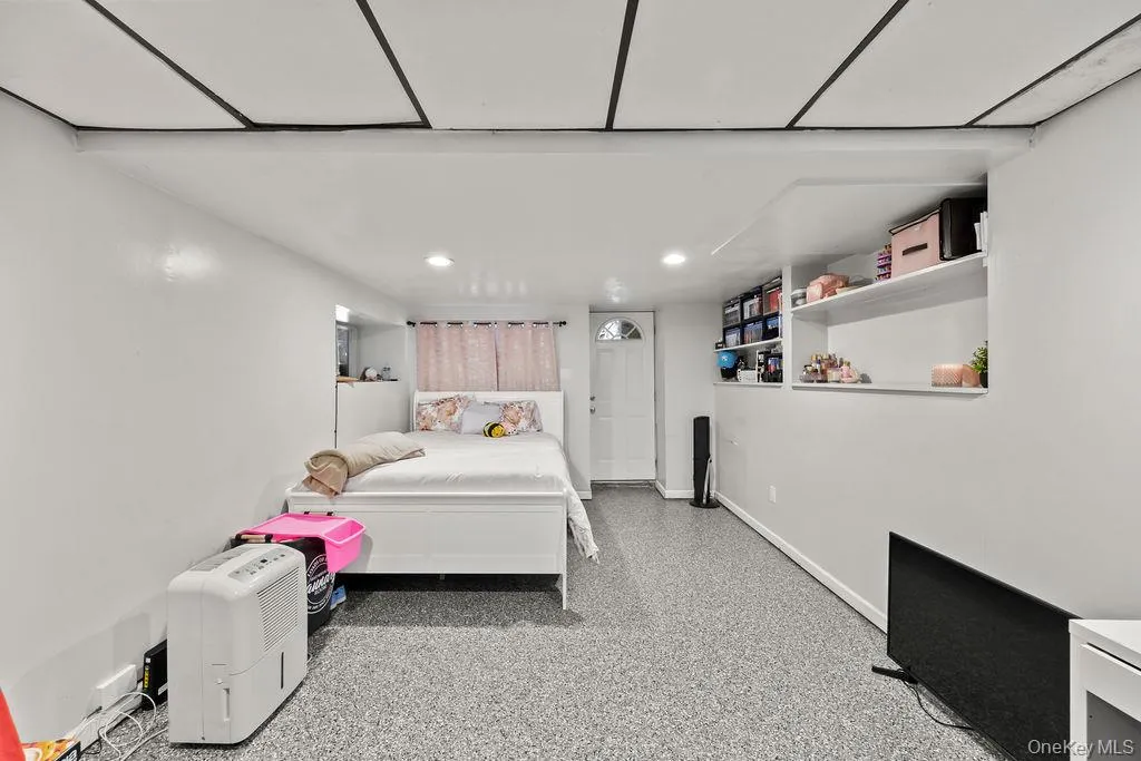 Bedroom with baseboards and recessed lighting Bedroom with baseboards and recessed lighting
