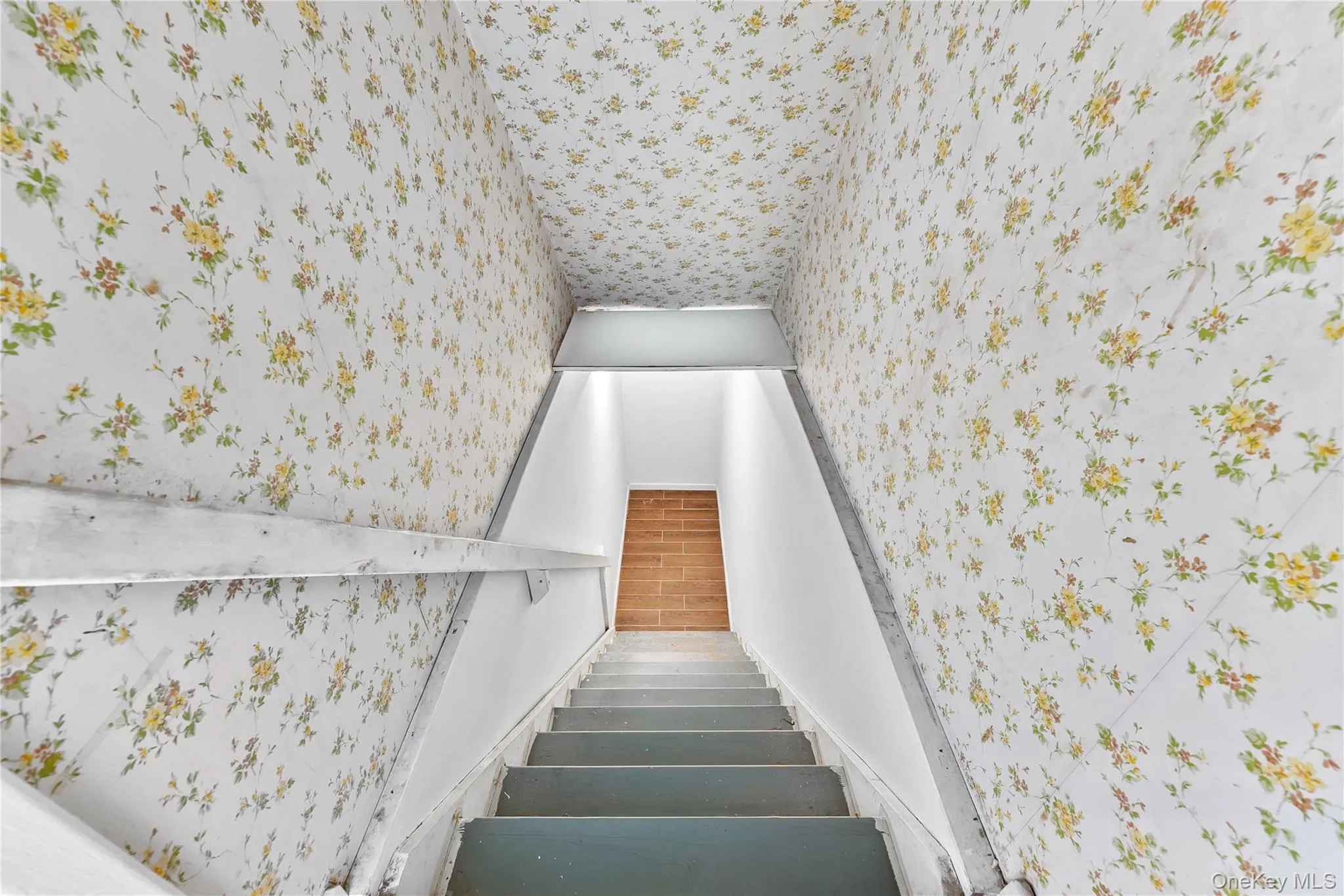 Stairway with wallpapered walls Stairway with wallpapered walls