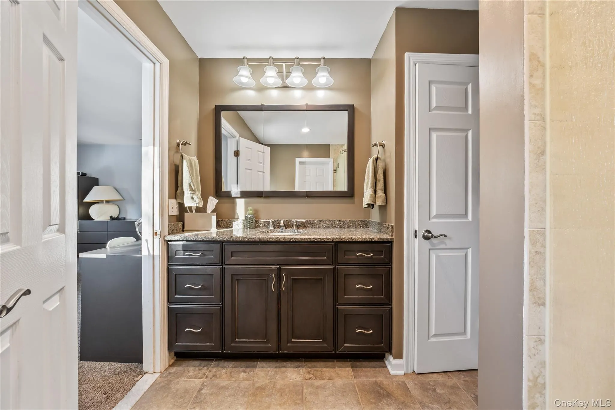 Bathroom featuring vanity Bathroom featuring vanity