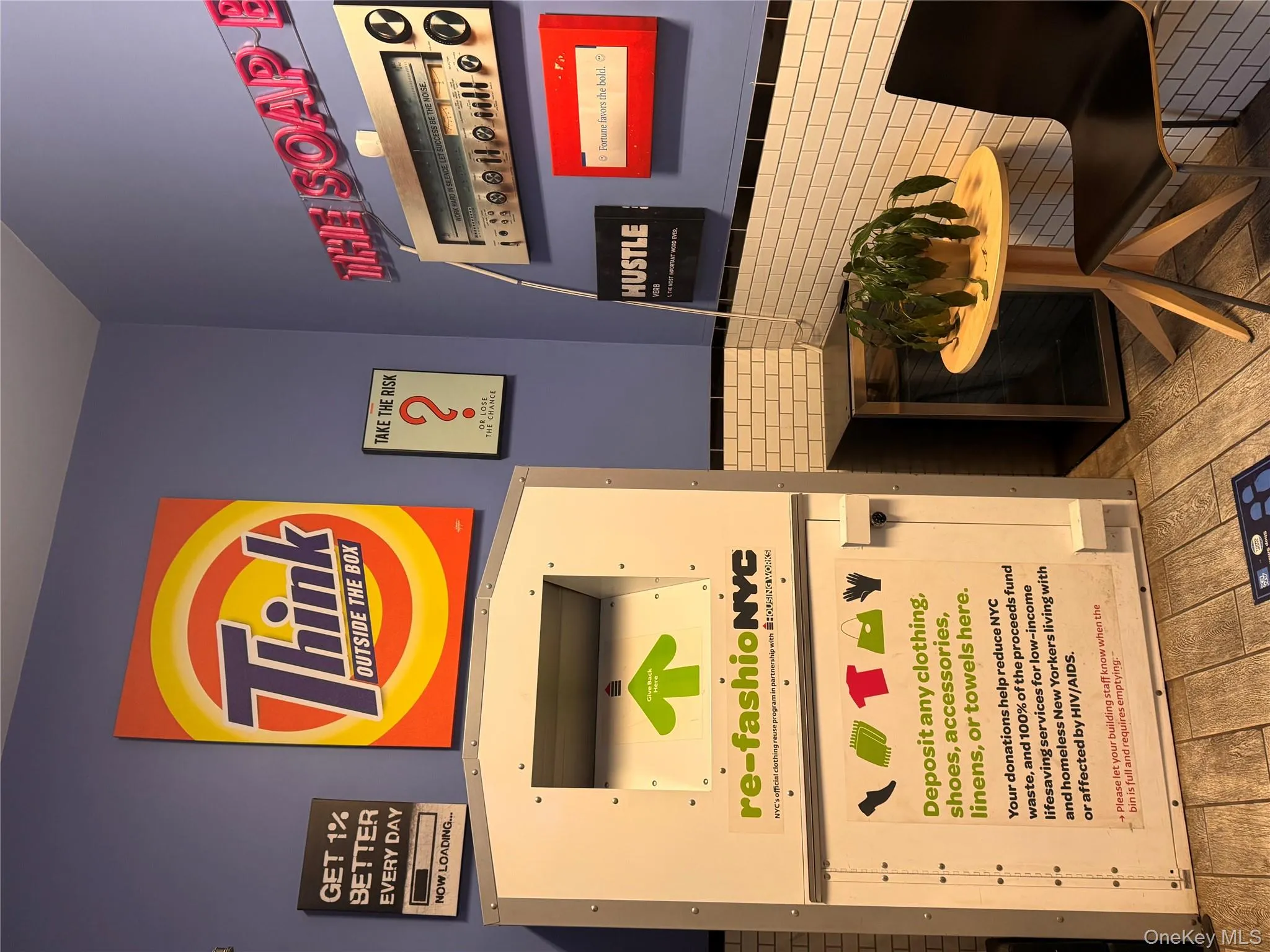 Detailed view of a wainscoted wall, wood finished floors, and tile walls Detailed view of a wainscoted wall, wood finished floors, and tile walls