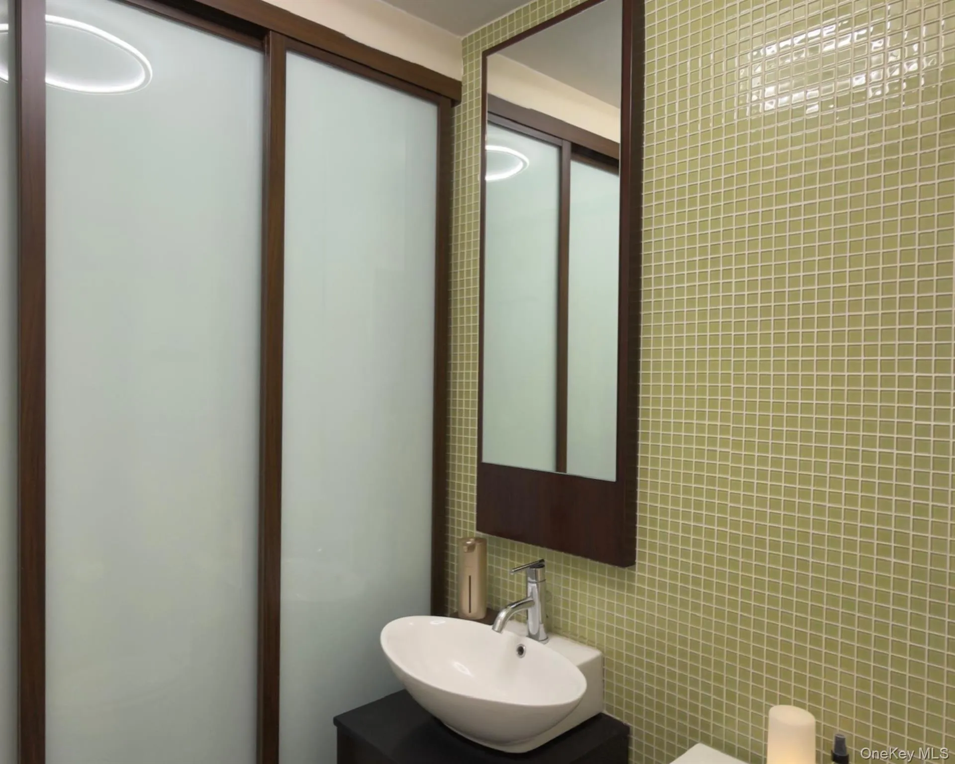 Bathroom with tile walls and vanity Bathroom with tile walls and vanity