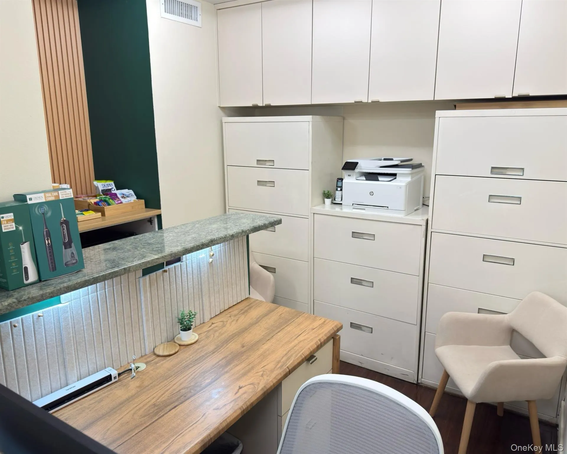 Office area featuring dark wood finished floors Office area featuring dark wood finished floors