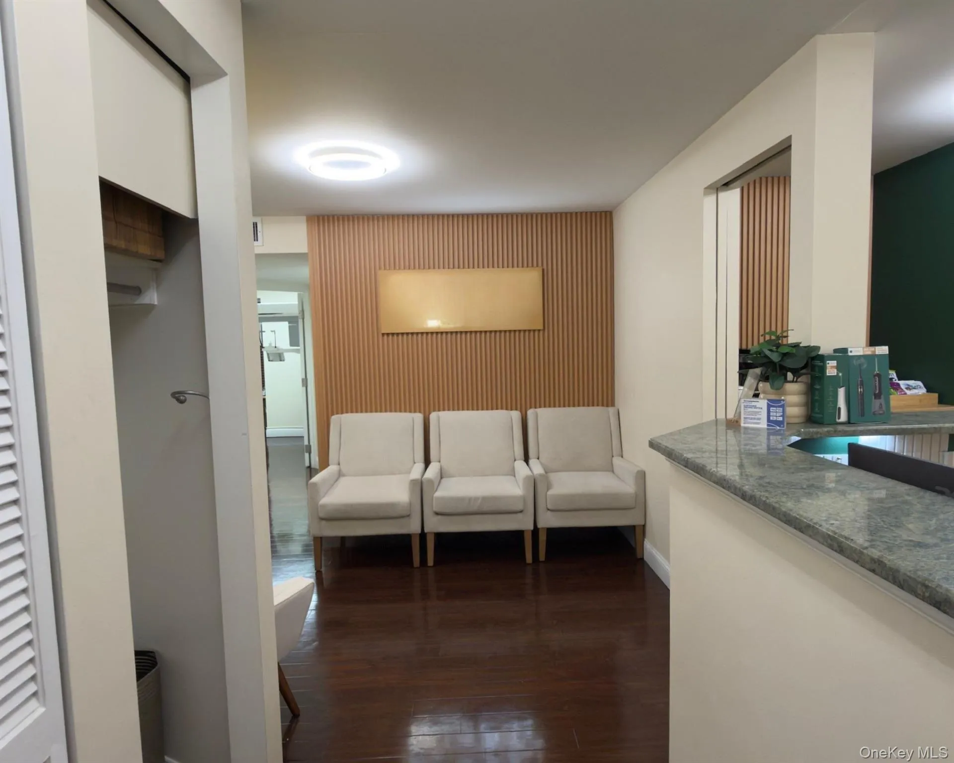 Hall featuring dark wood-type flooring Hall featuring dark wood-type flooring