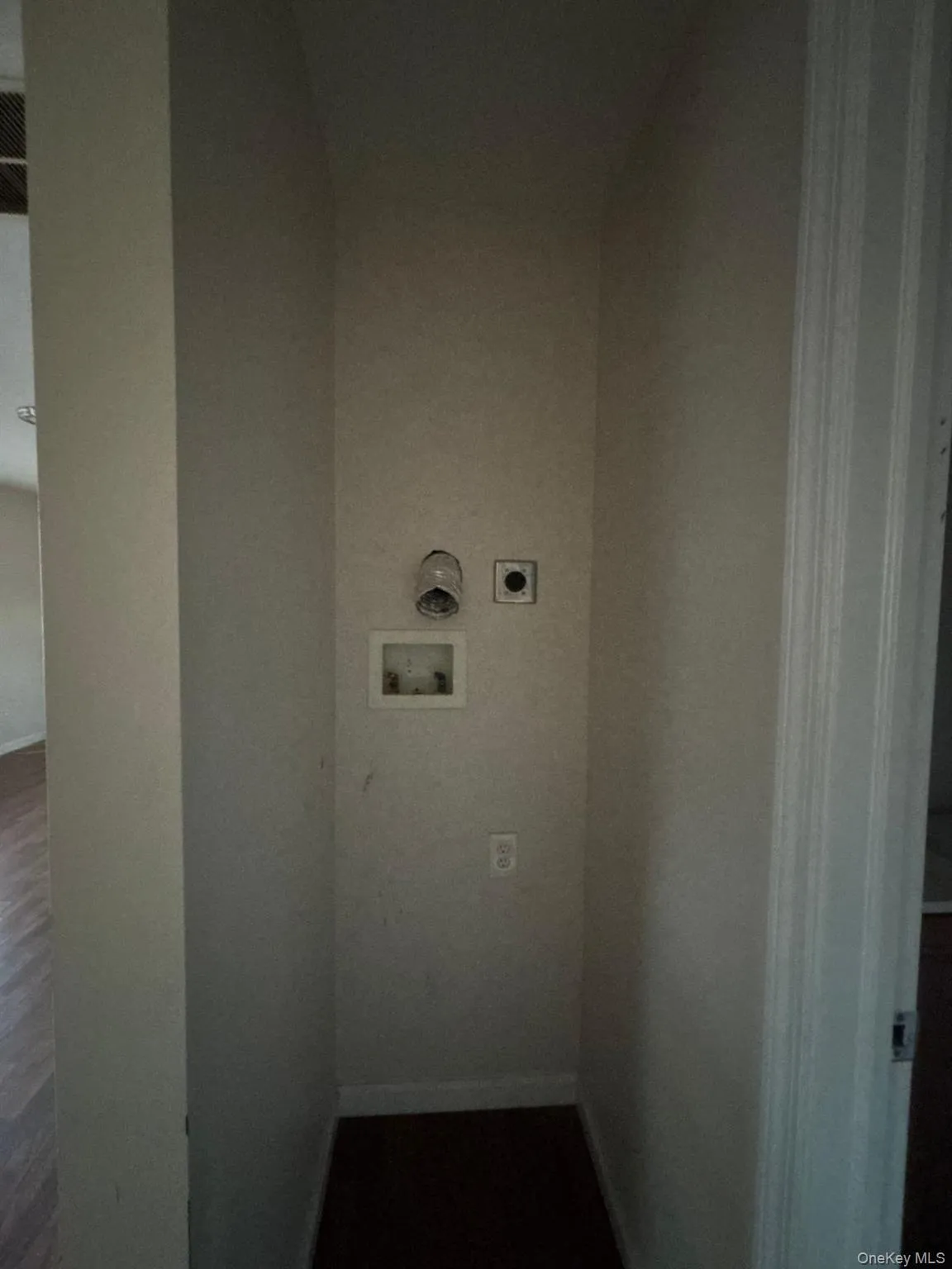 Laundry area with washer hookup and baseboards Laundry area with washer hookup and baseboards