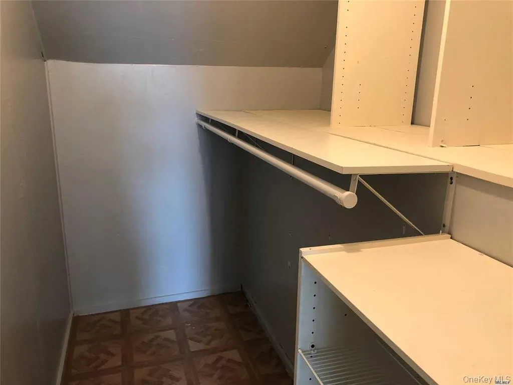 View of walk in closet View of walk in closet