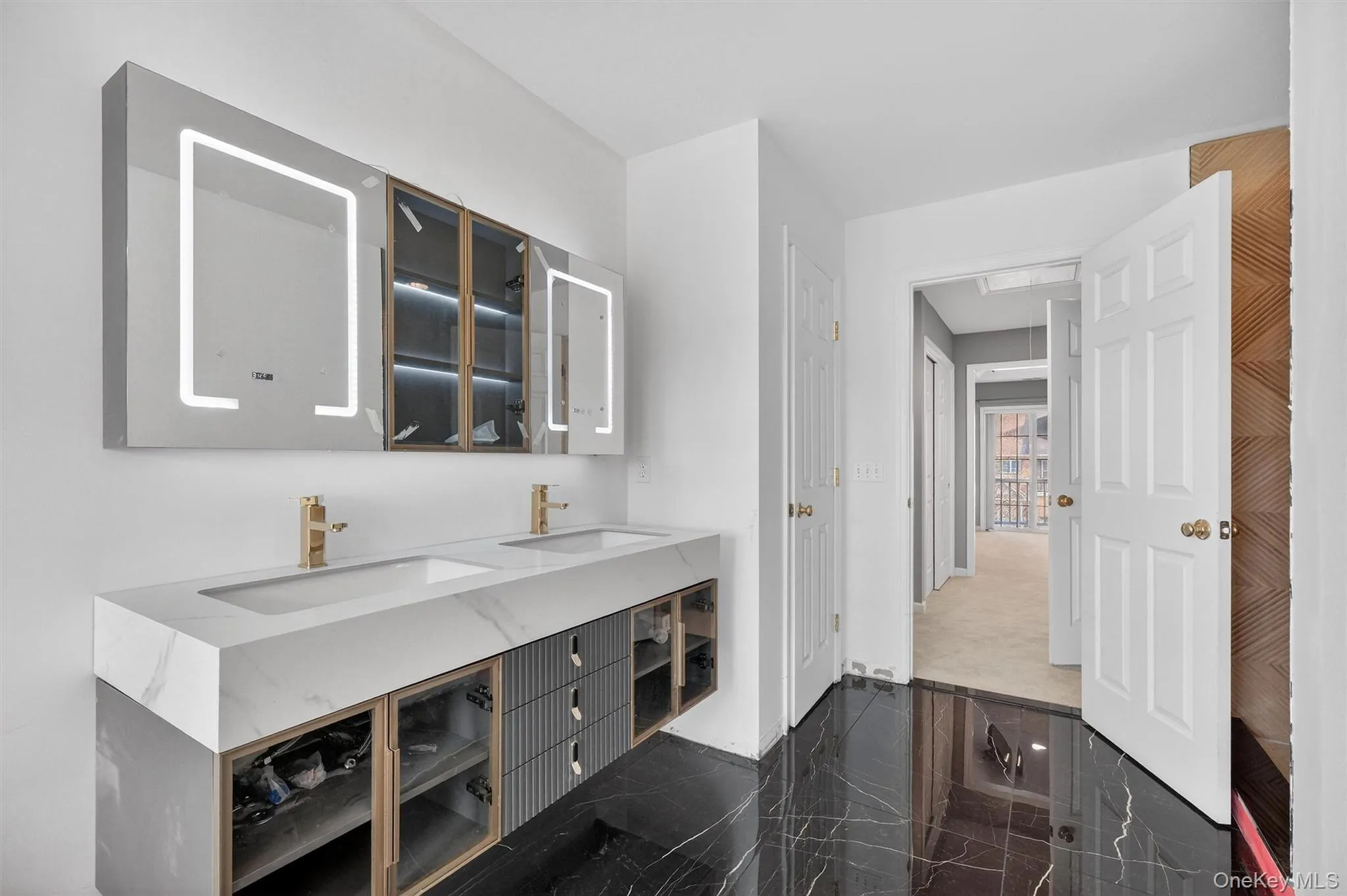 Bar area with glass insert cabinets and light stone countertops Bar area with glass insert cabinets and light stone countertops