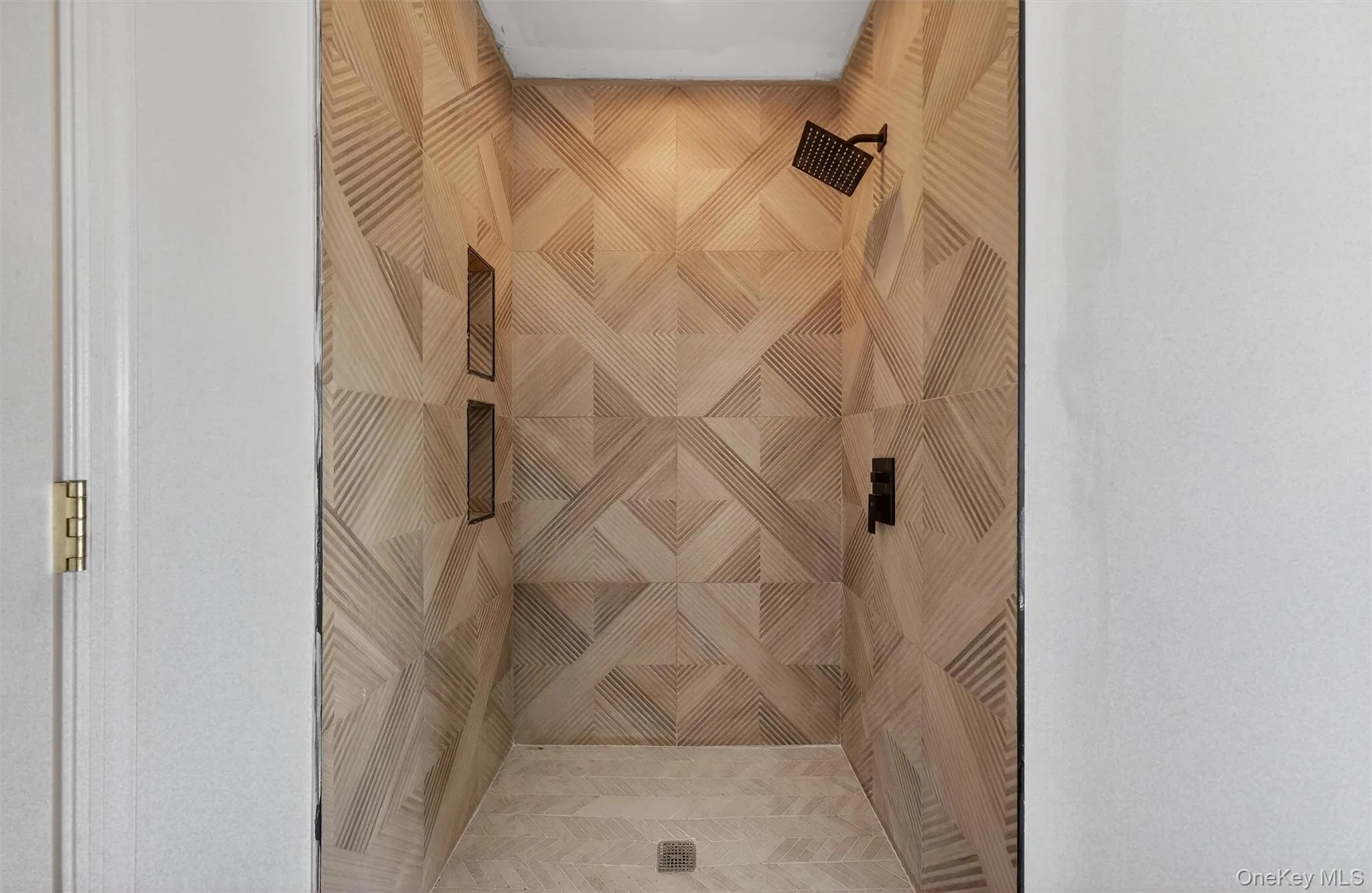 Full bathroom featuring a stall shower Full bathroom featuring a stall shower