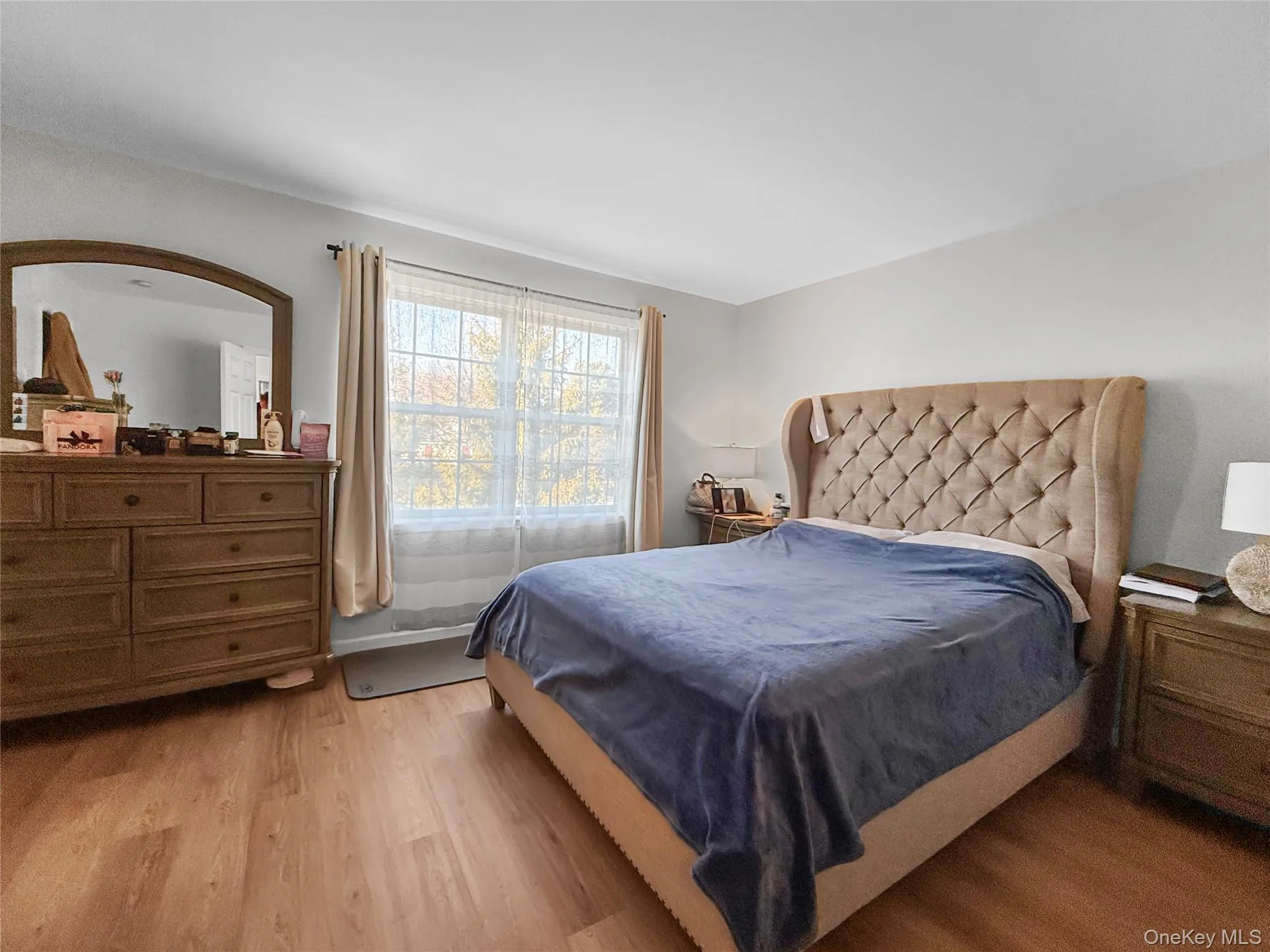 Bedroom with wood finished floors Bedroom with wood finished floors