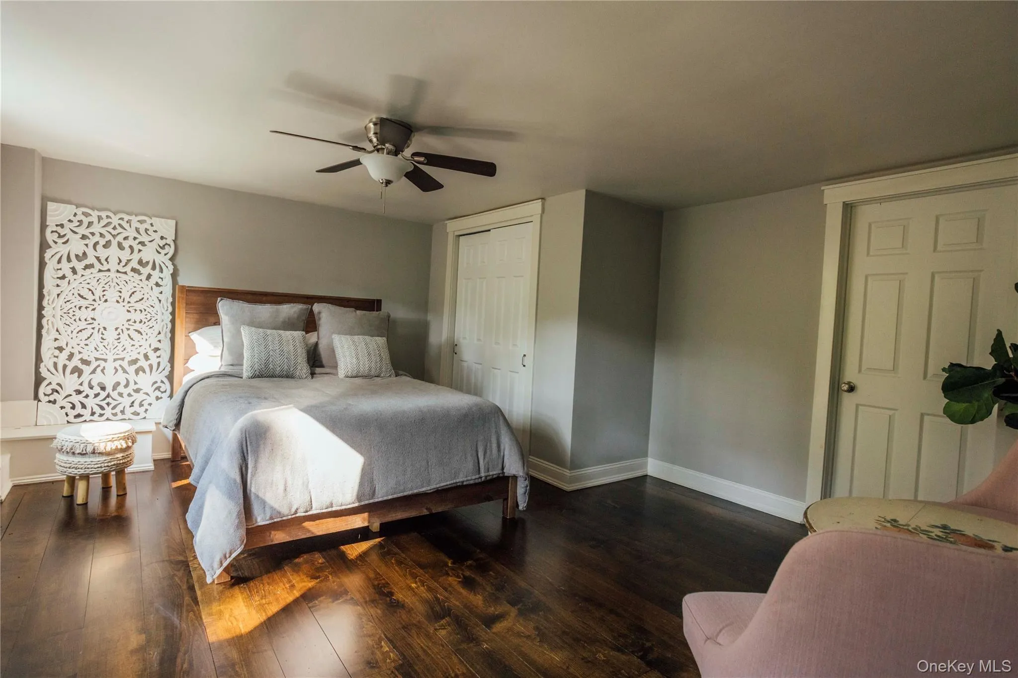 Bedroom with hardwood / wood-style floors, a closet, and ceiling fan Bedroom with hardwood / wood-style floors, a closet, and ceiling fan