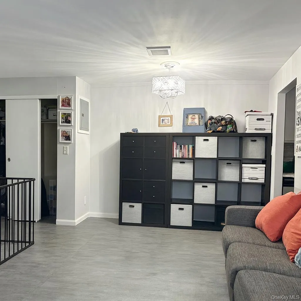 Sitting room with a chandelier Sitting room with a chandelier