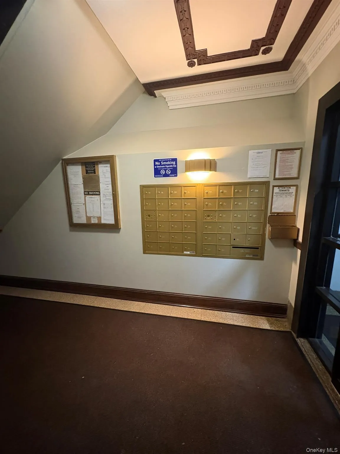 View of community featuring mail area and lofted ceiling View of community featuring mail area and lofted ceiling