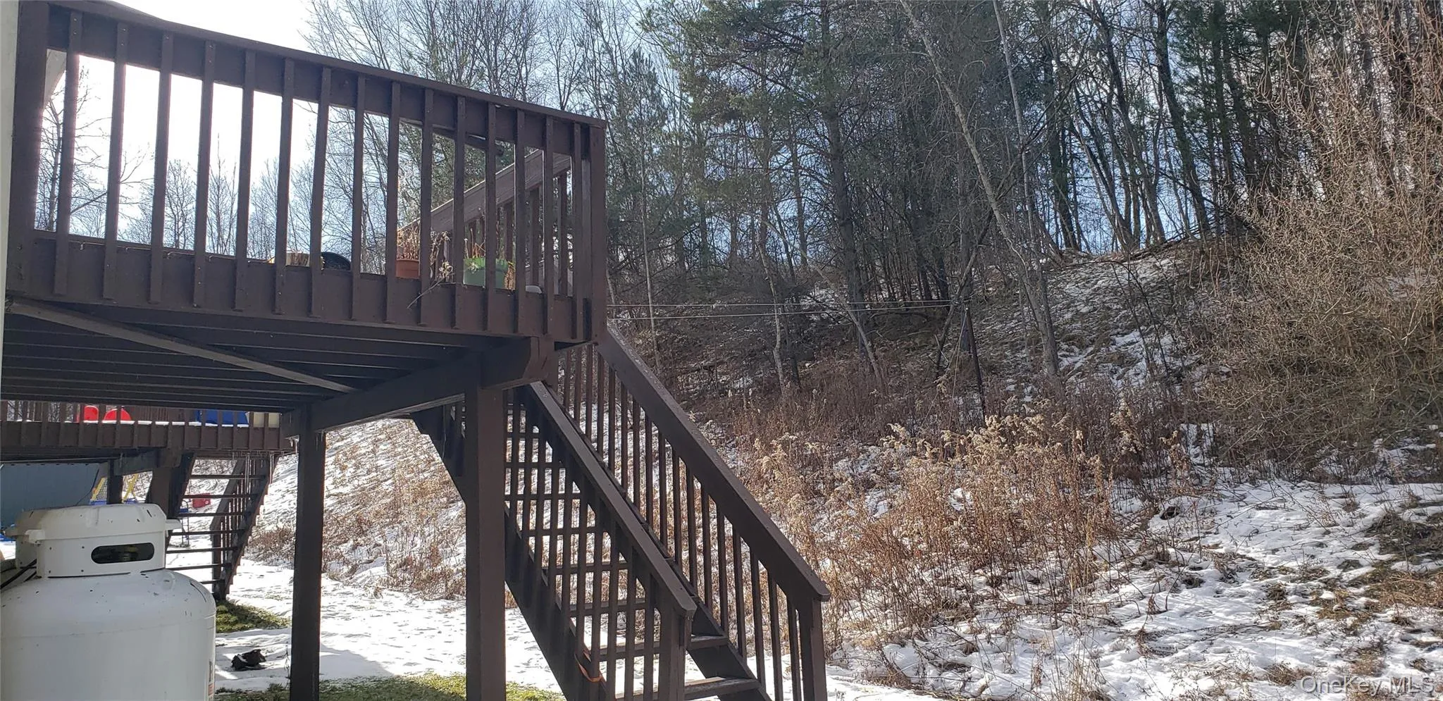 Snow covered deck with stairs Snow covered deck with stairs