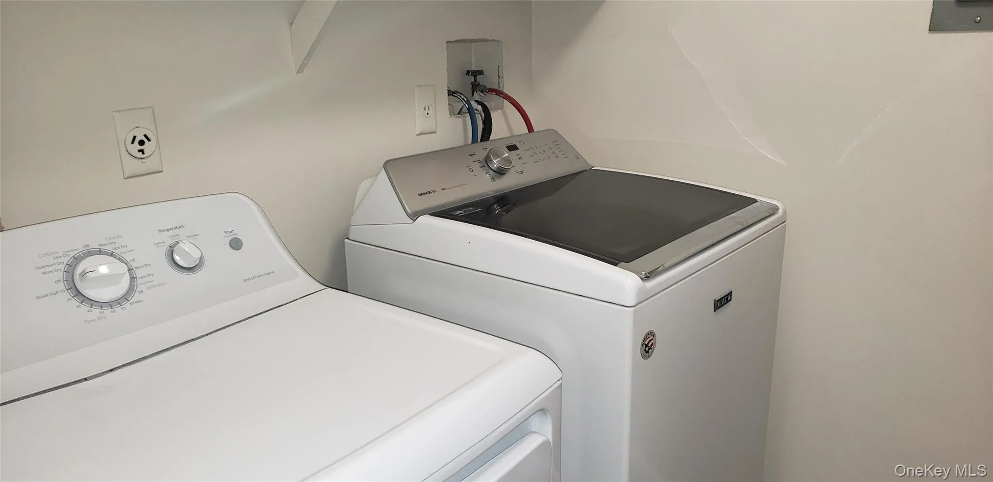 Laundry room with independent washer and dryer Laundry room with independent washer and dryer