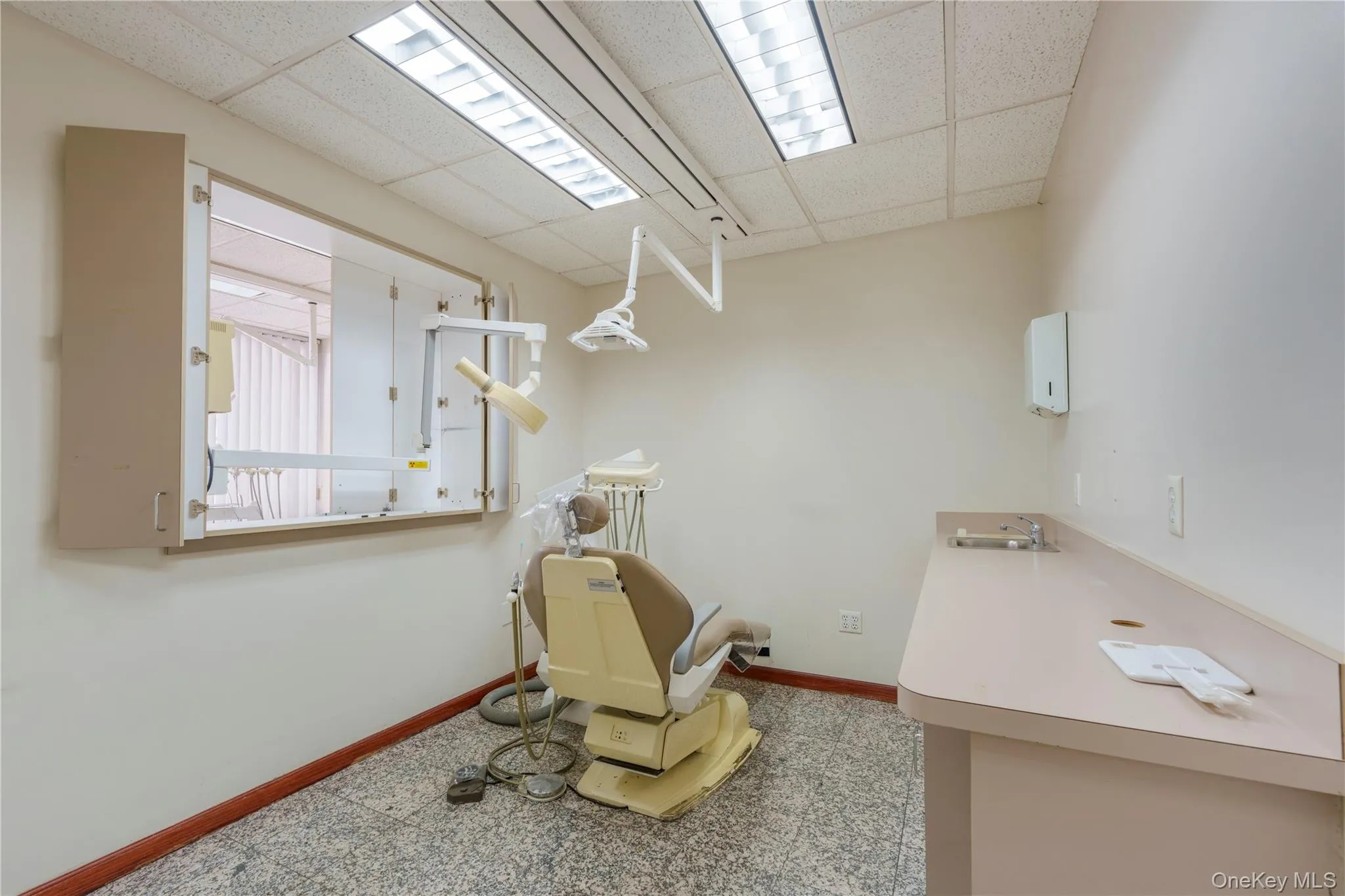 Miscellaneous room featuring a drop ceiling Miscellaneous room featuring a drop ceiling