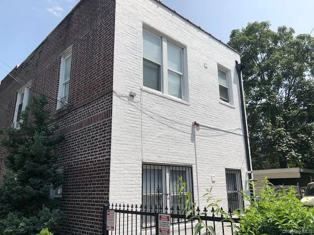 View of side of home featuring brick siding View of side of home featuring brick siding