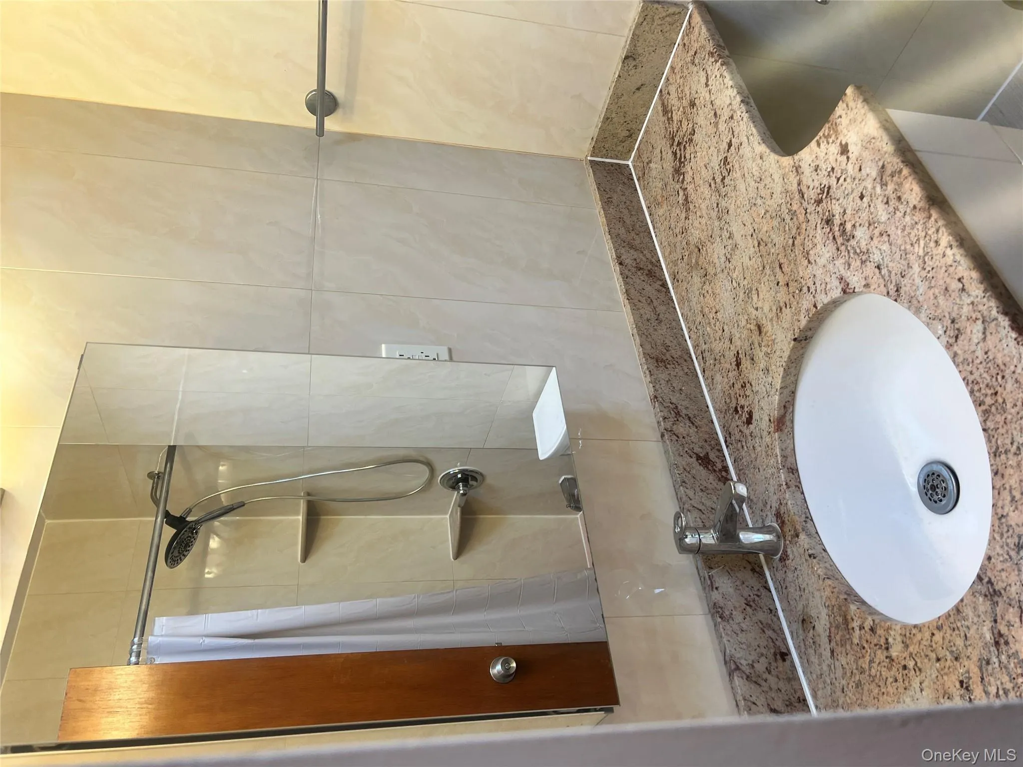 Full bathroom with a shower with curtain and vanity Full bathroom with a shower with curtain and vanity