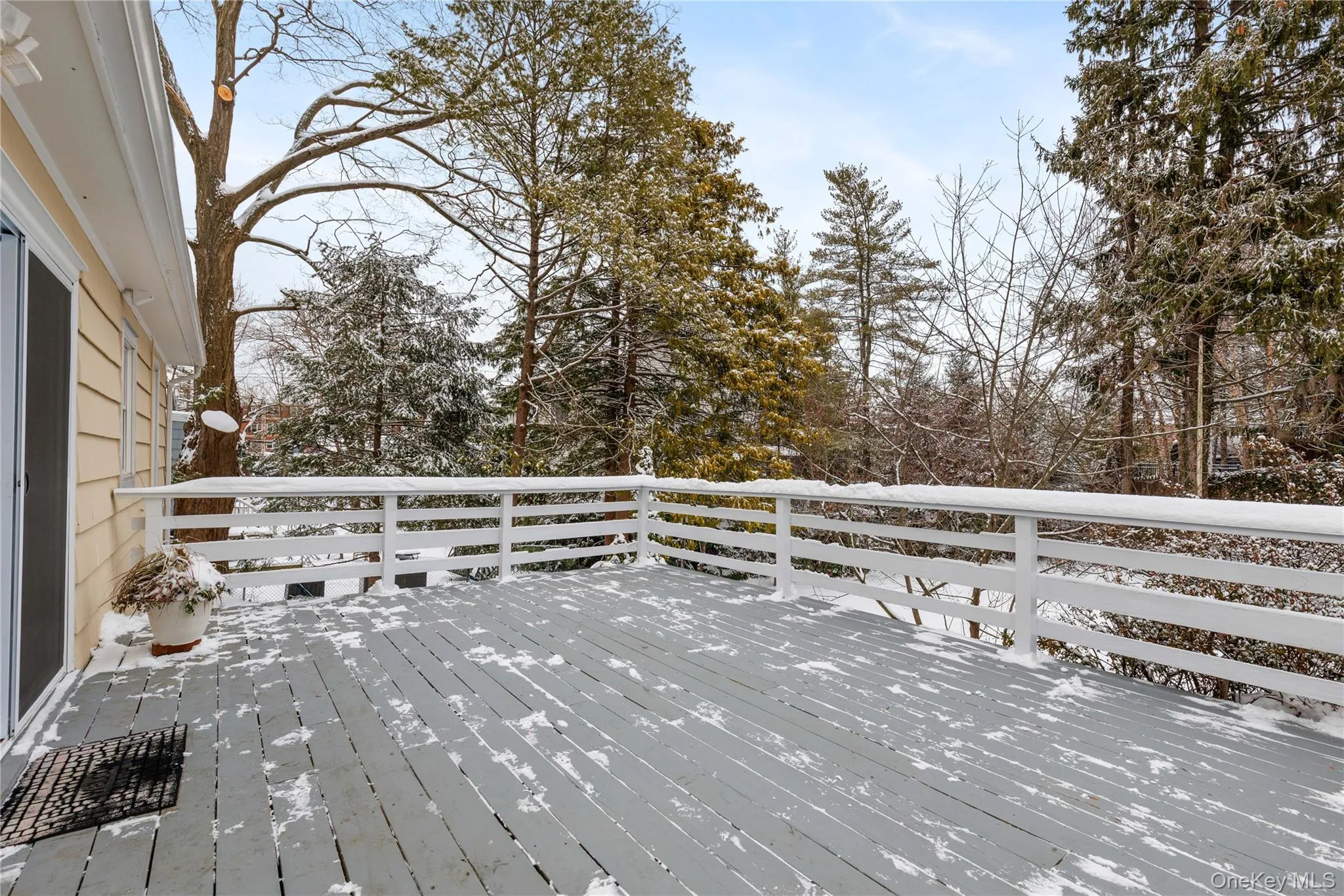 View of snow covered deck View of snow covered deck