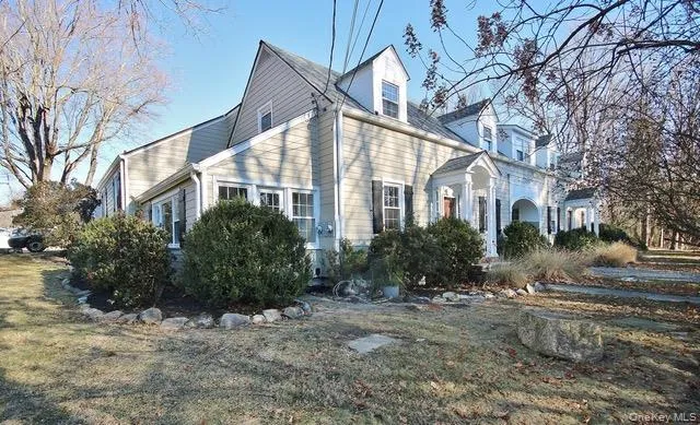 View of property exterior with a yard View of property exterior with a yard