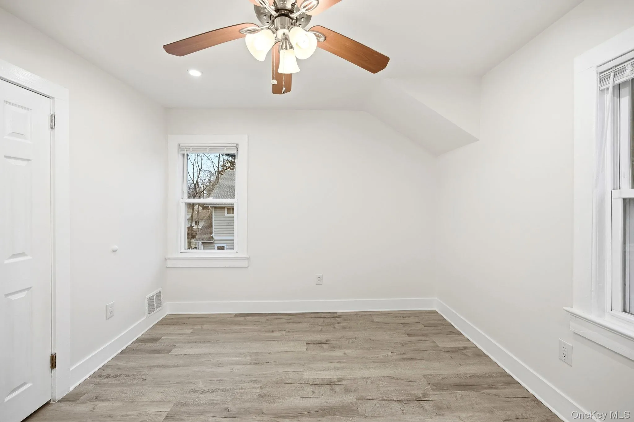 Bonus room featuring light wood-style floors, ceiling fan, and recessed lighting Bonus room featuring light wood-style floors, ceiling fan, and recessed lighting