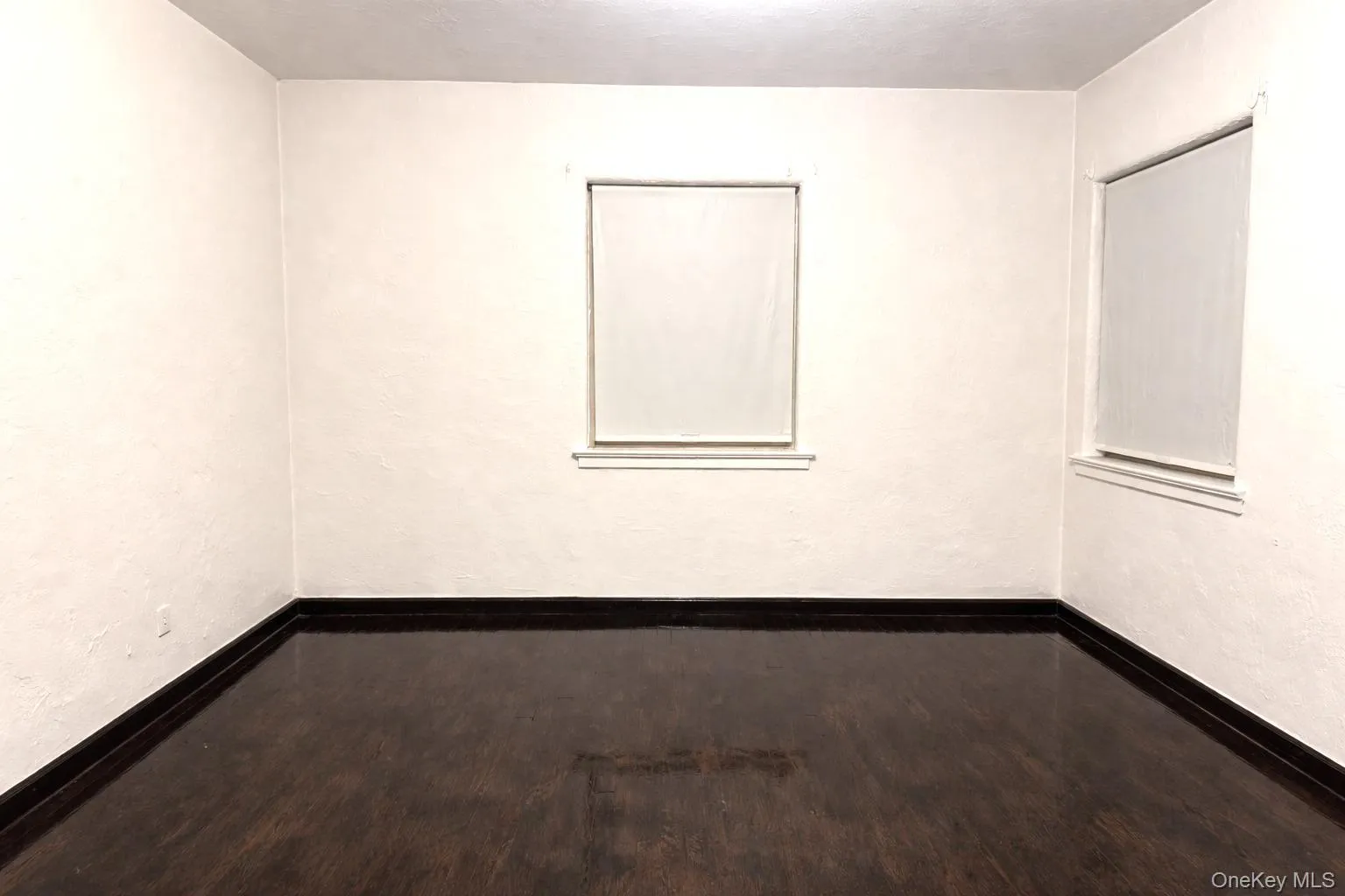 Spare room with baseboards Spare room with baseboards