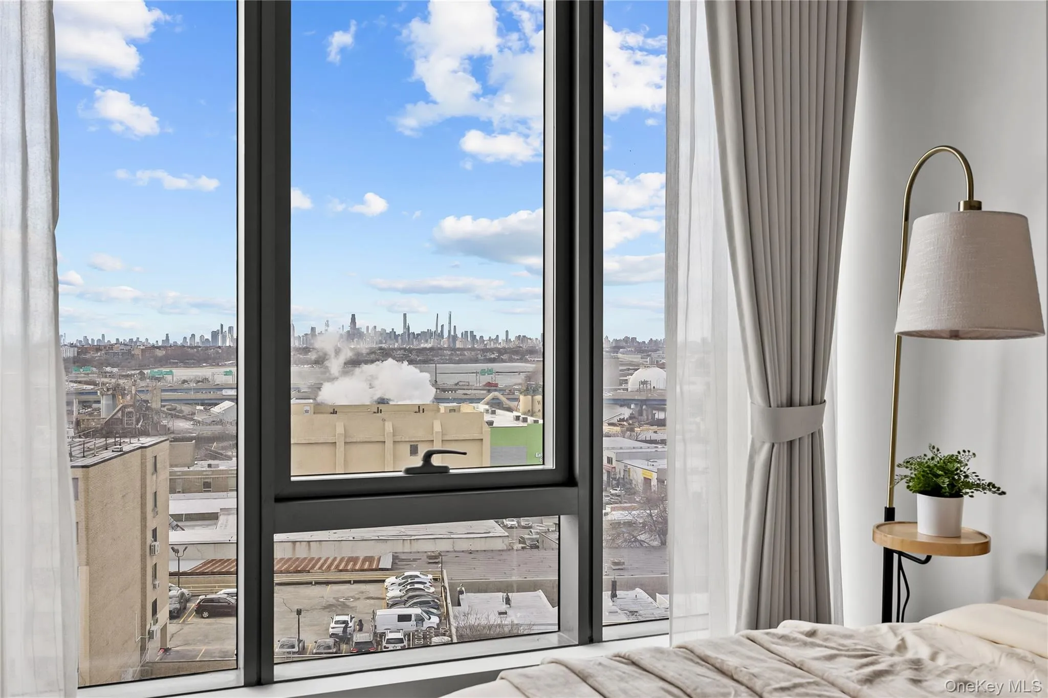 Bedroom featuring a view of skyline Bedroom featuring a view of skyline