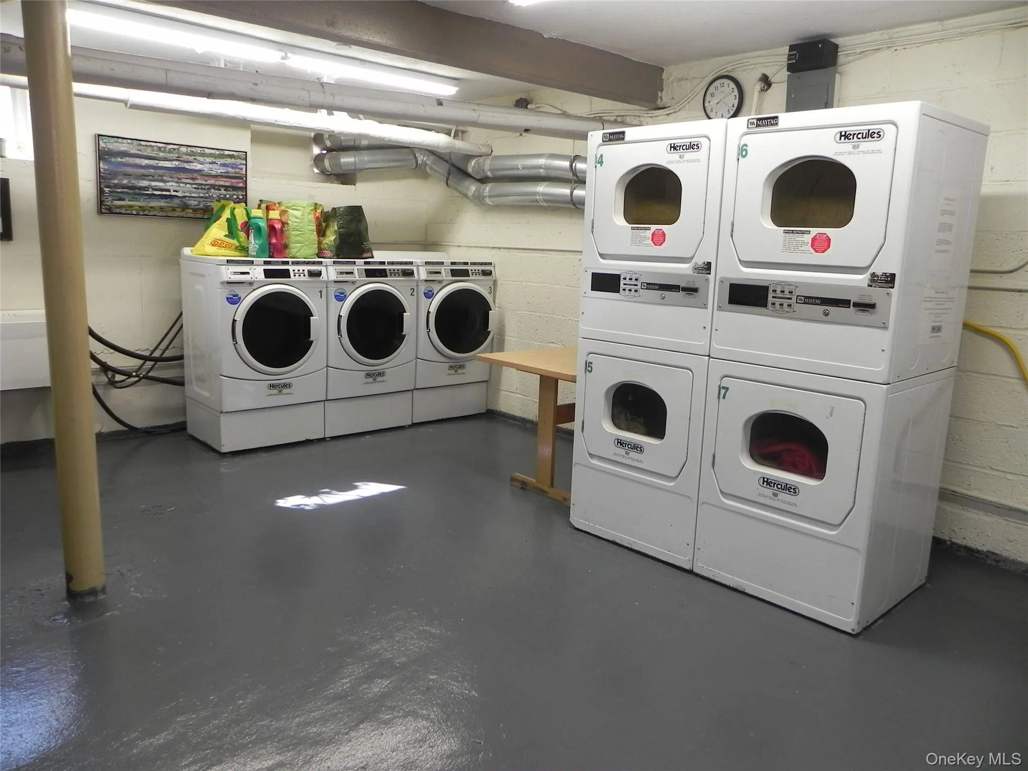 Community laundry featuring independent washer and dryer and stacked washer / dryer Community laundry featuring independent washer and dryer and stacked washer / dryer