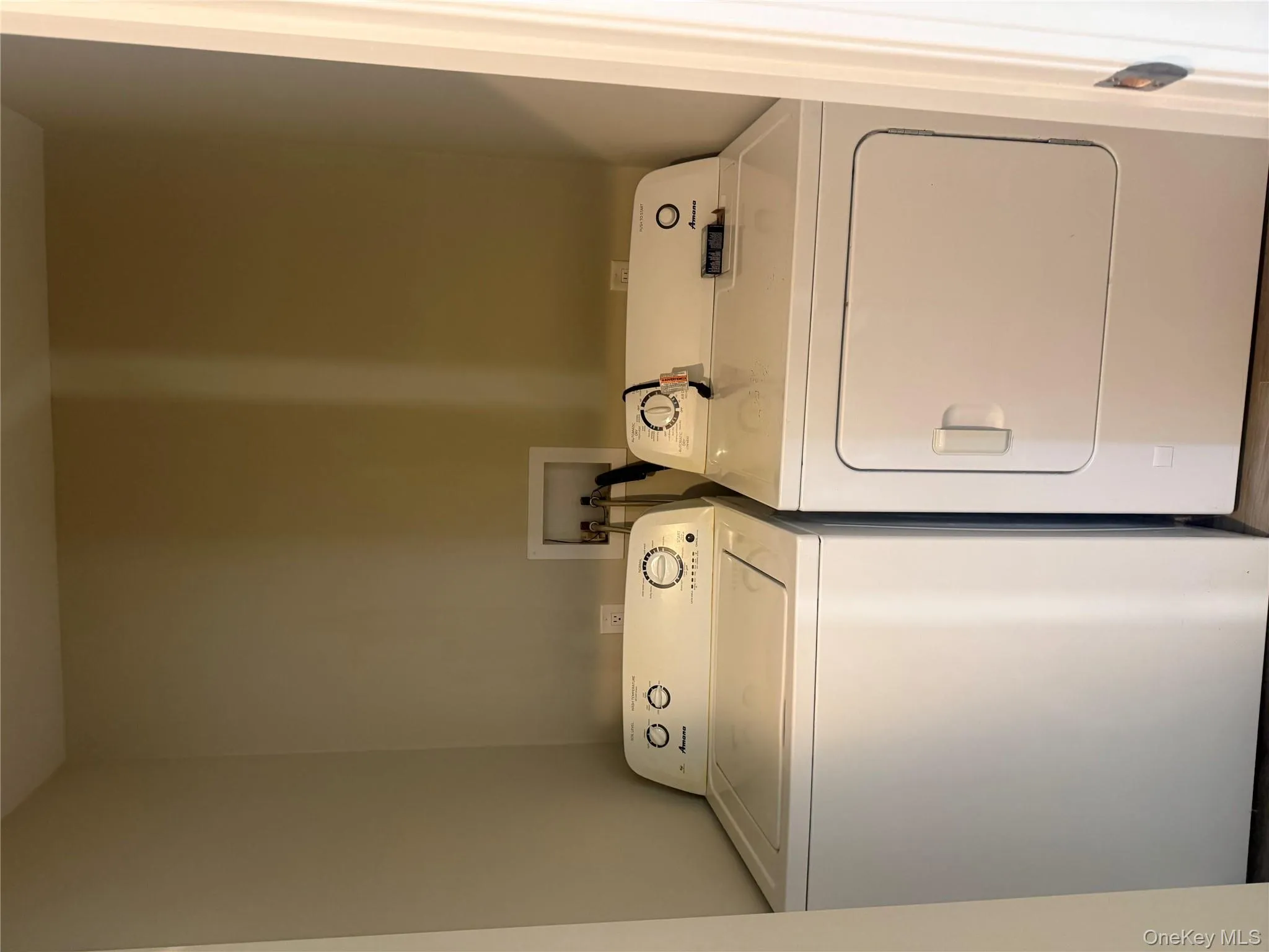 Laundry room with separate washer and dryer Laundry room with separate washer and dryer