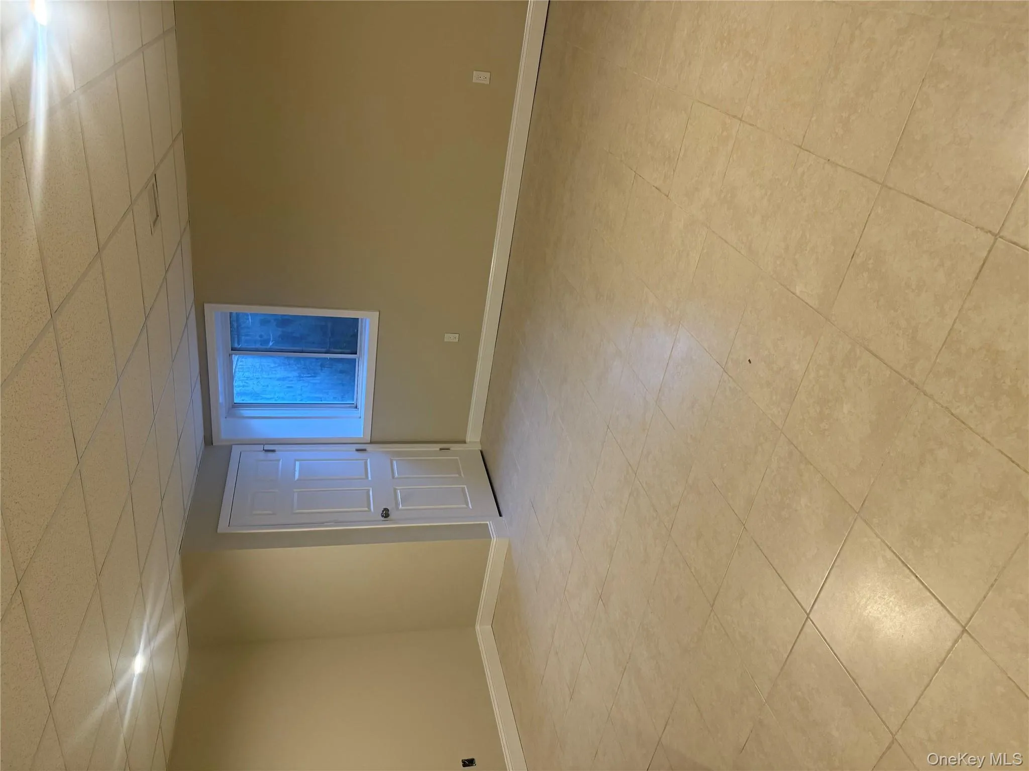 Empty room with a paneled ceiling Empty room with a paneled ceiling