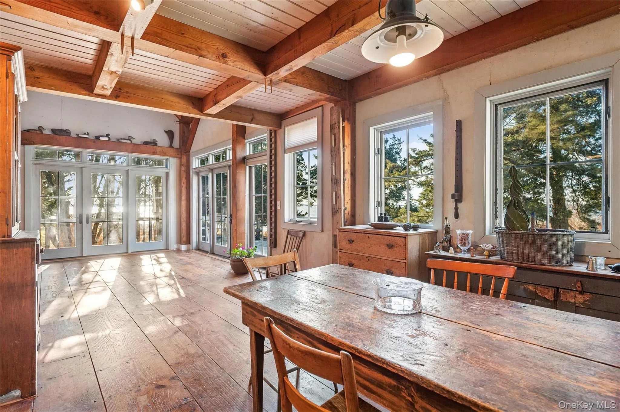 Sunroom / solarium with beamed ceiling and french doors Sunroom / solarium with beamed ceiling and french doors