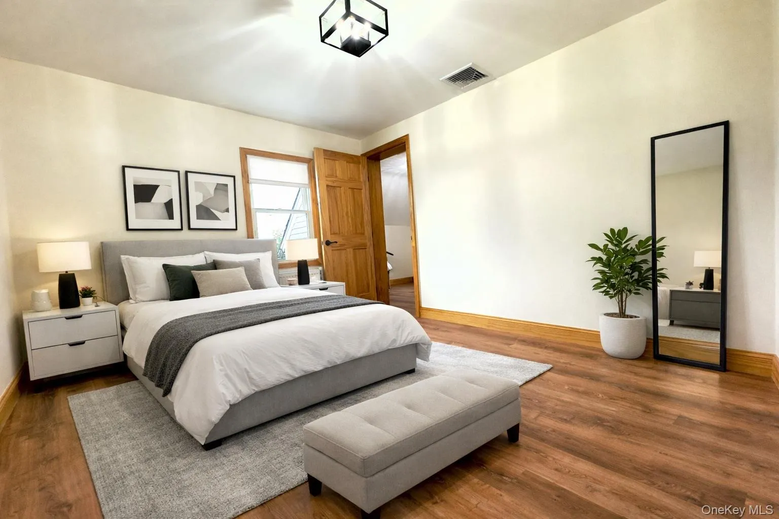 Bedroom with wood finished floors Bedroom with wood finished floors