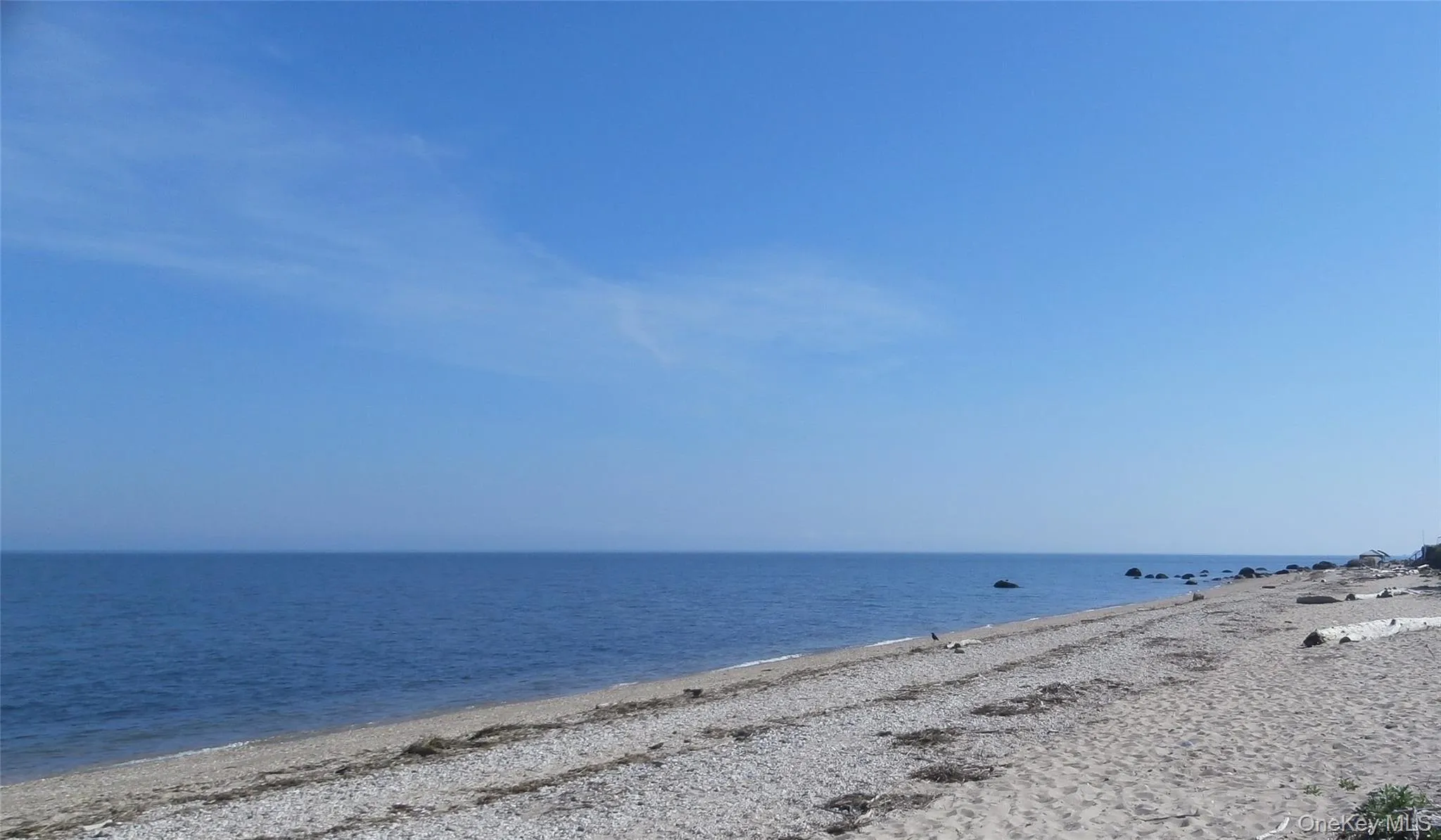 Water view featuring local beach Water view featuring local beach
