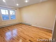 Unfurnished room featuring wood finished floors and recessed lighting Unfurnished room featuring wood finished floors and recessed lighting