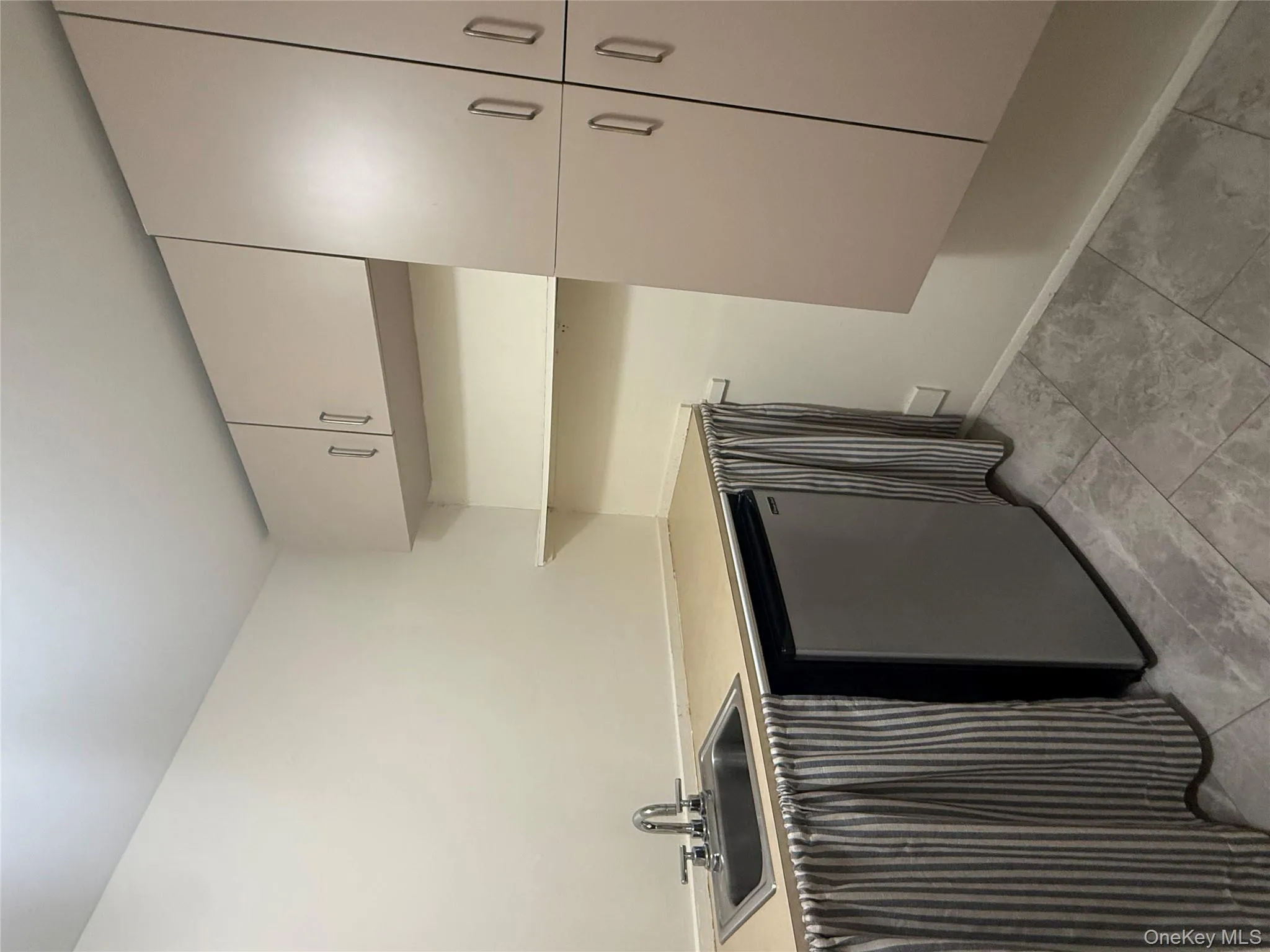 Pantry with sink and small fridge Pantry with sink and small fridge