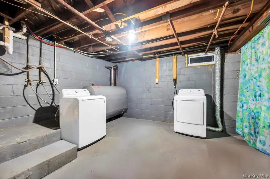 Unfinished below grade area with oil tank Unfinished below grade area with oil tank
