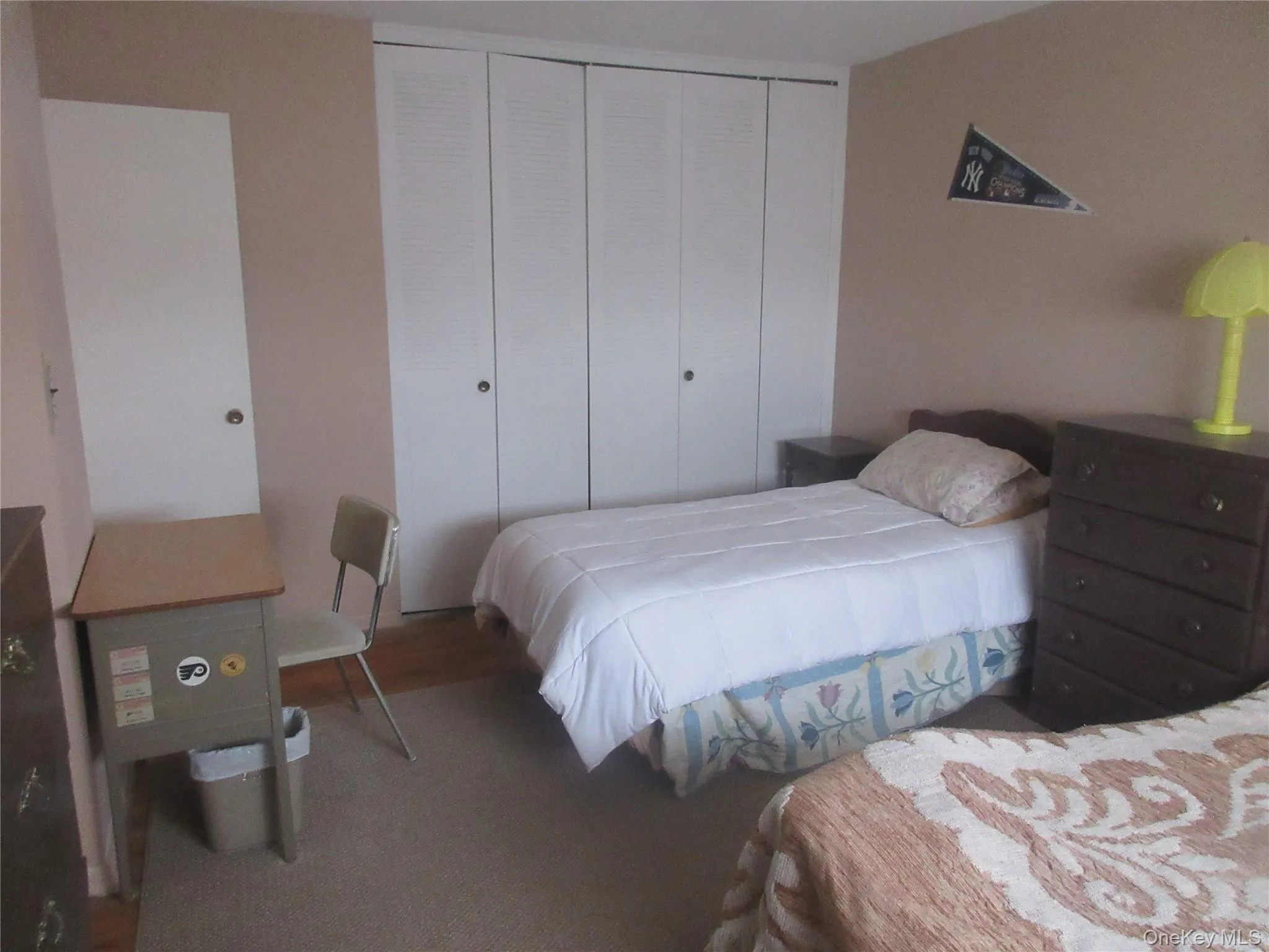 Bedroom with a closet Bedroom with a closet