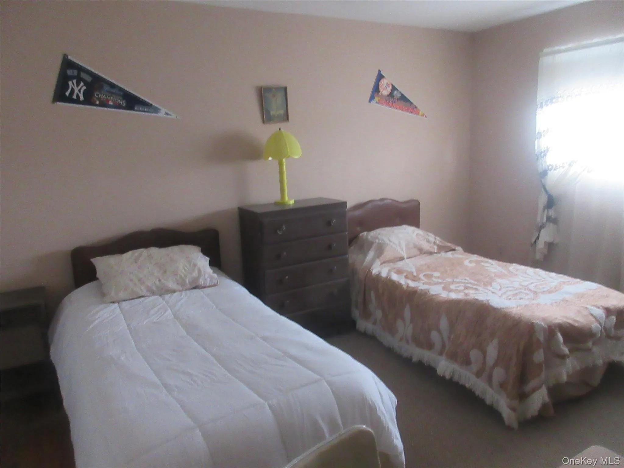 Bedroom featuring carpet flooring Bedroom featuring carpet flooring