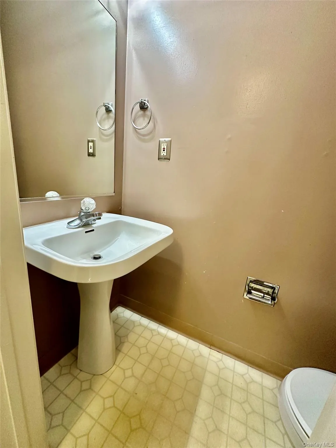 Lower level half bathroom Lower level half bathroom