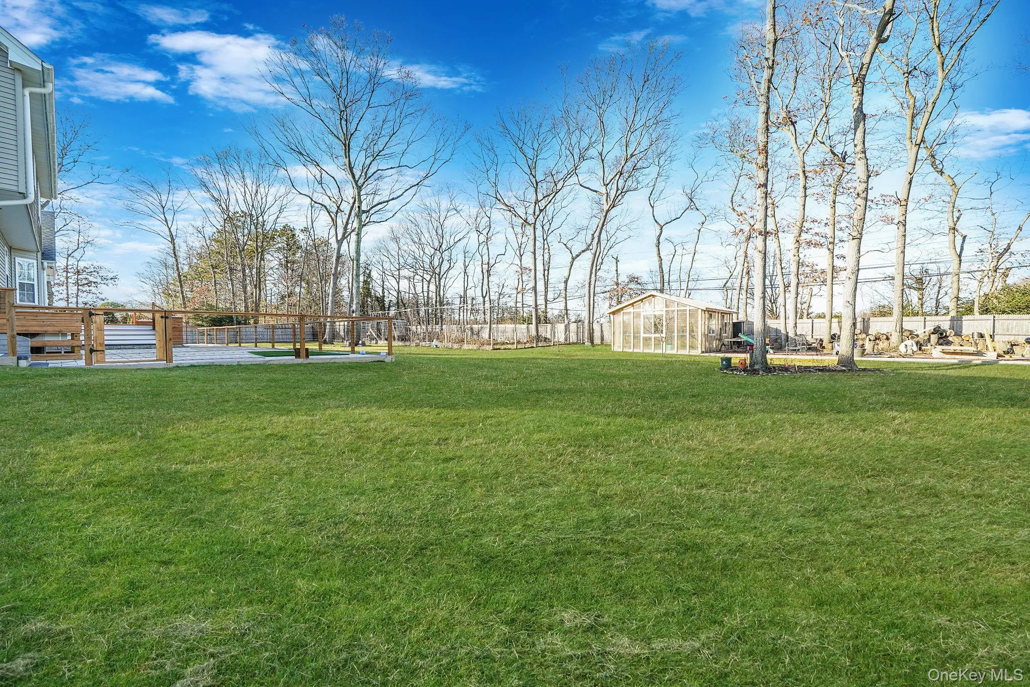 View of yard featuring an exterior structure and an outdoor structure View of yard featuring an exterior structure and an outdoor structure
