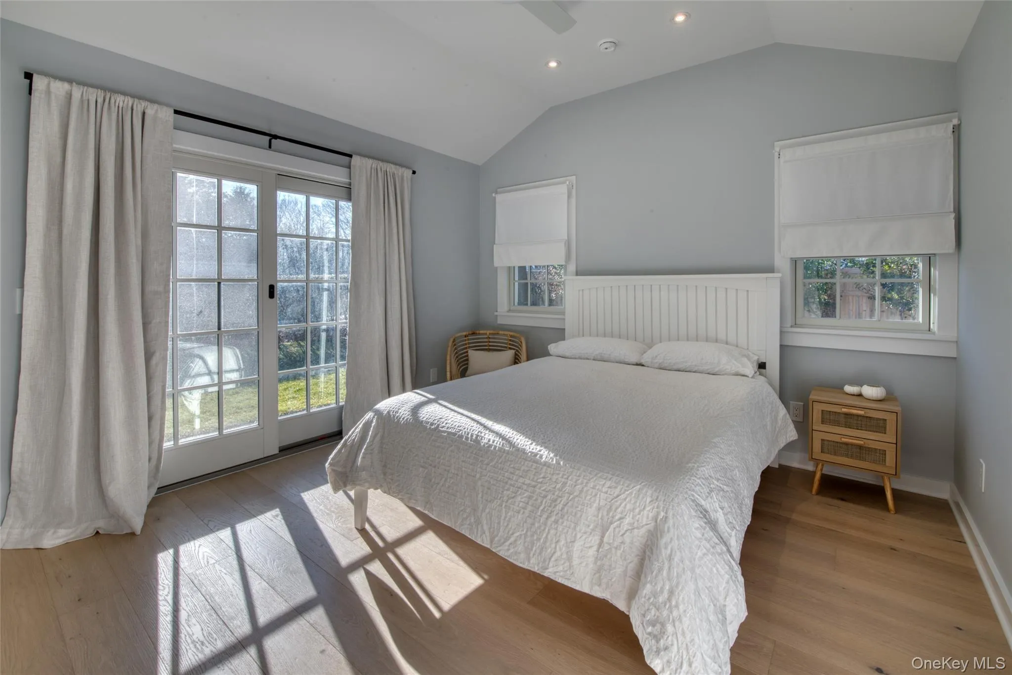 Bedroom with queen bed & access to outside Bedroom with queen bed & access to outside
