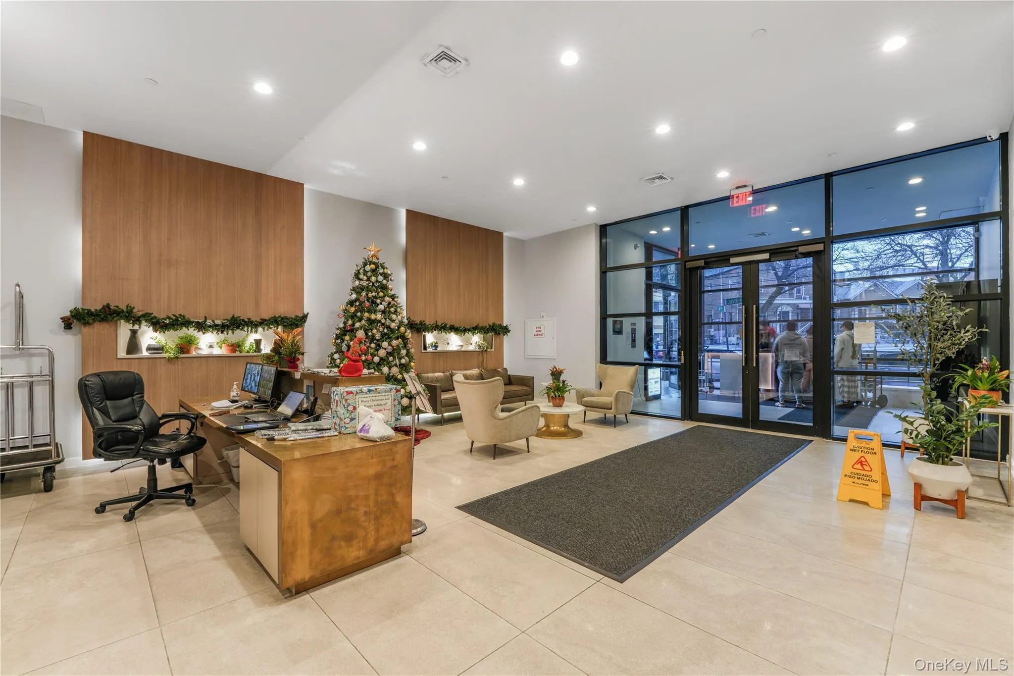 Common area with floor to ceiling windows and recessed lighting Common area with floor to ceiling windows and recessed lighting