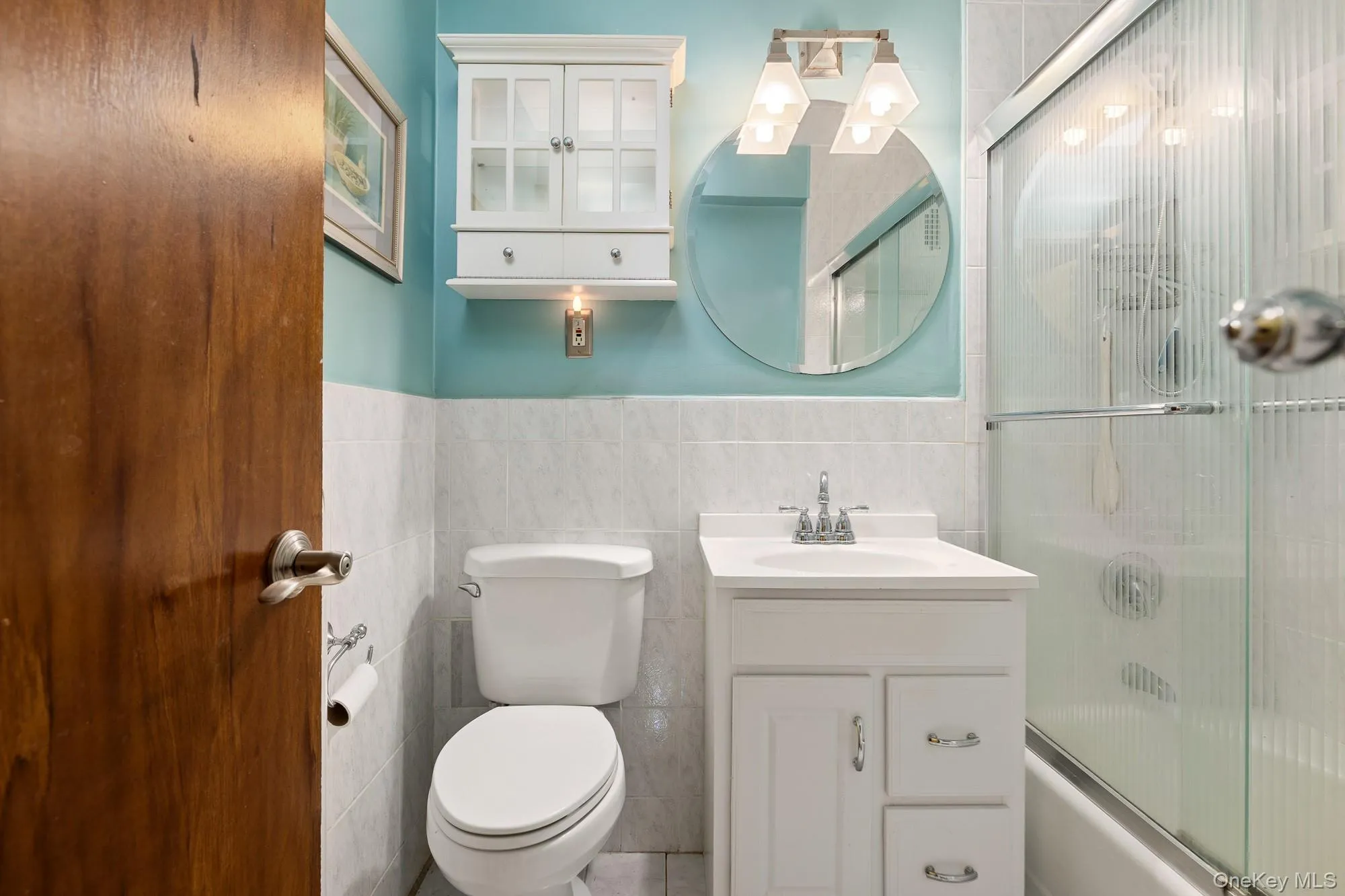 Full bathroom w glass shower doors Full bathroom w glass shower doors