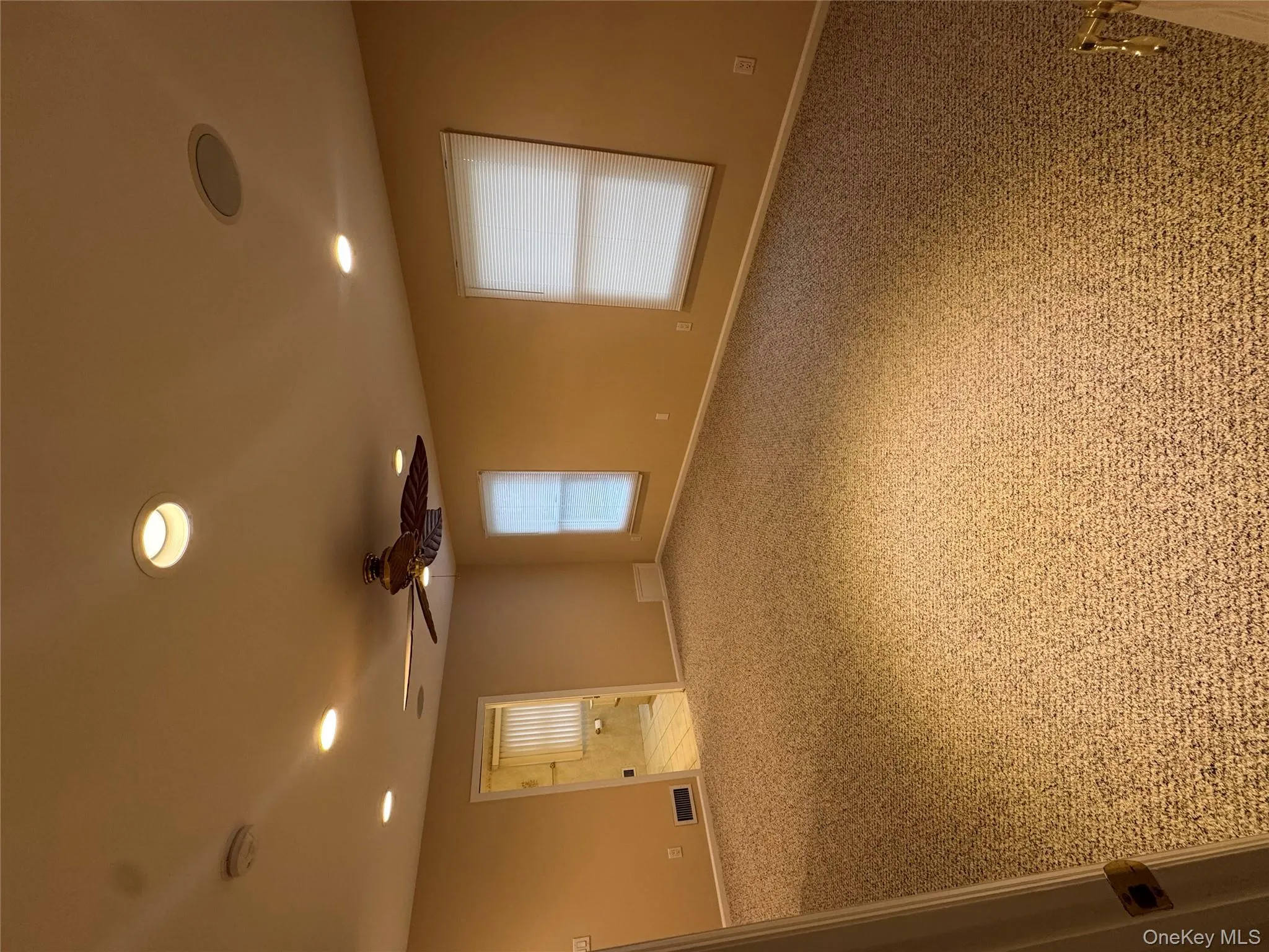 Carpeted spare room featuring recessed lighting and a ceiling fan Carpeted spare room featuring recessed lighting and a ceiling fan
