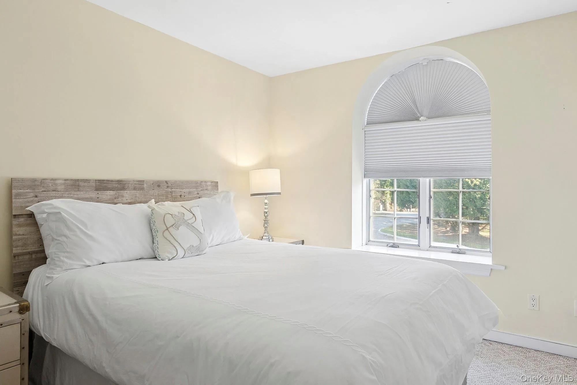 Bedroom featuring baseboards and carpet floors Bedroom featuring baseboards and carpet floors