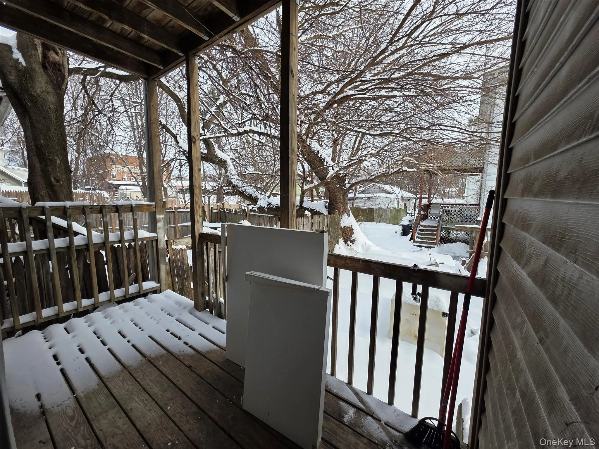 View of snow covered deck View of snow covered deck