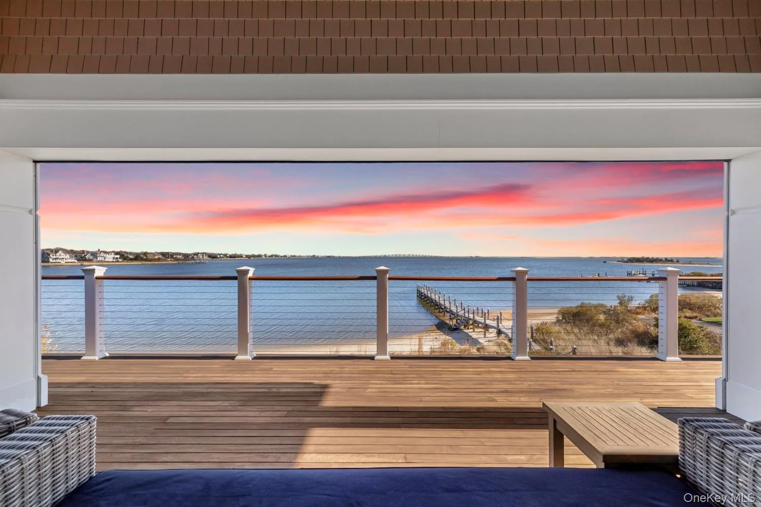 Wooden deck with a water view Wooden deck with a water view