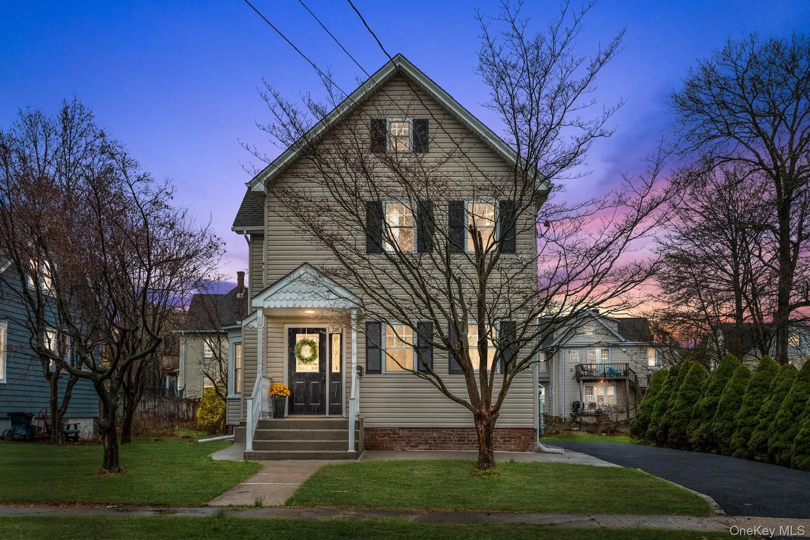 Traditional-style home featuring a yard Traditional-style home featuring a yard