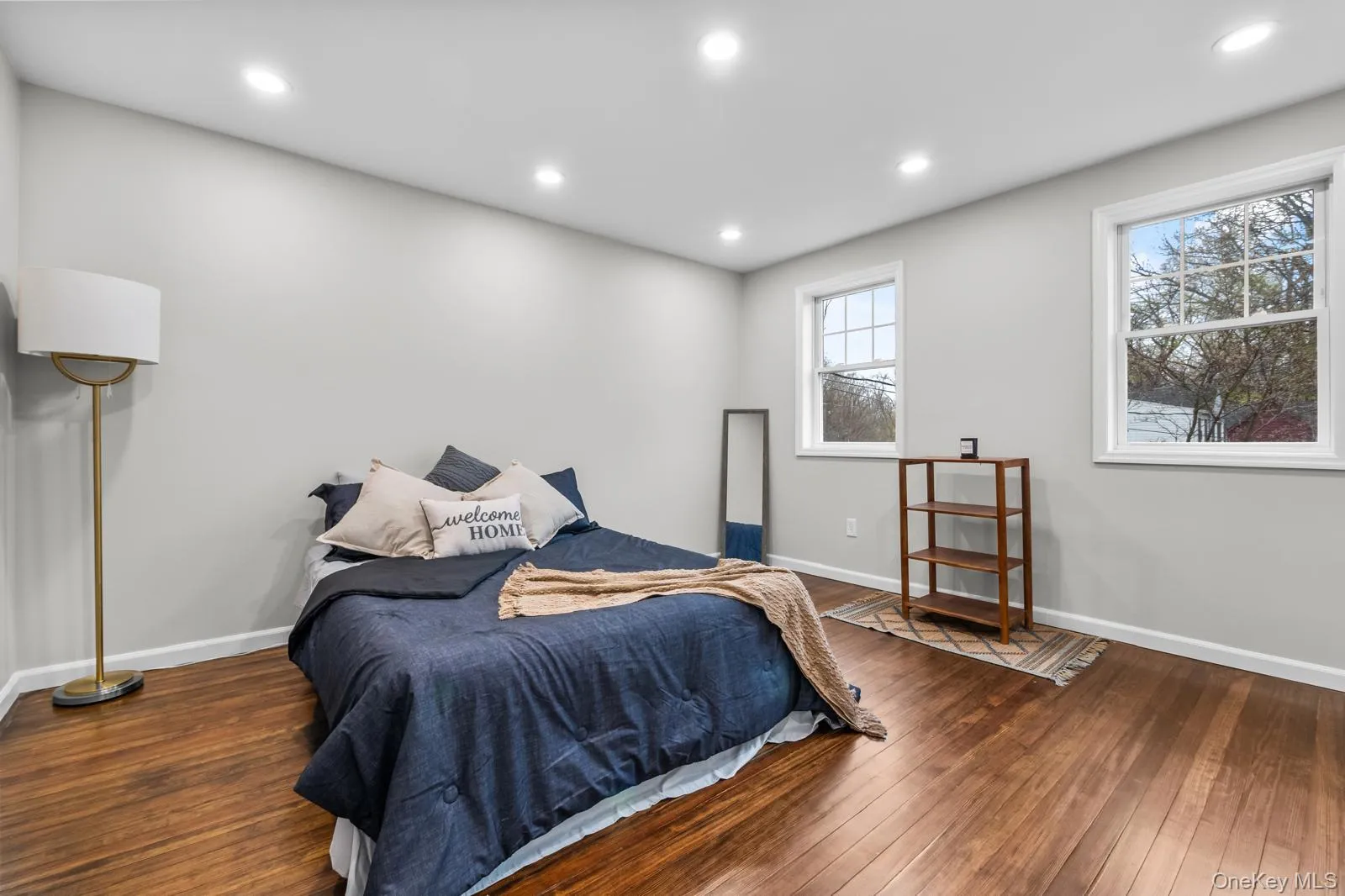 Bedroom with recessed lighting and hardwood / wood-style flooring Bedroom with recessed lighting and hardwood / wood-style flooring