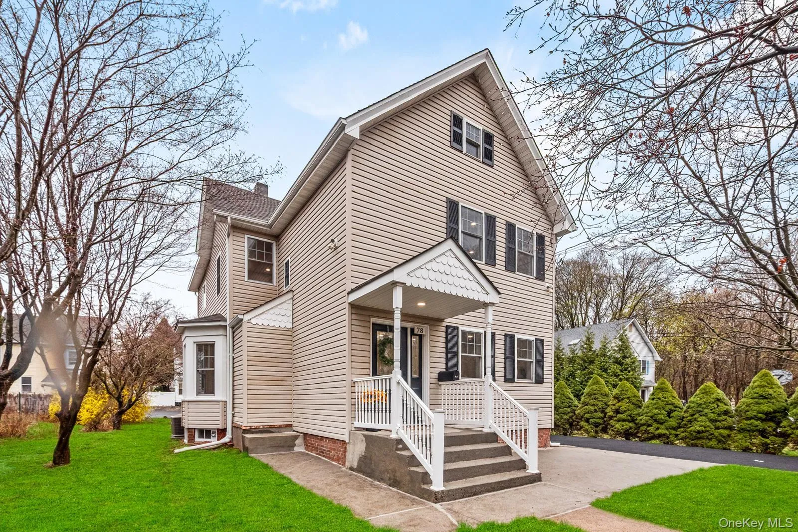 View of front of home featuring a front lawn View of front of home featuring a front lawn